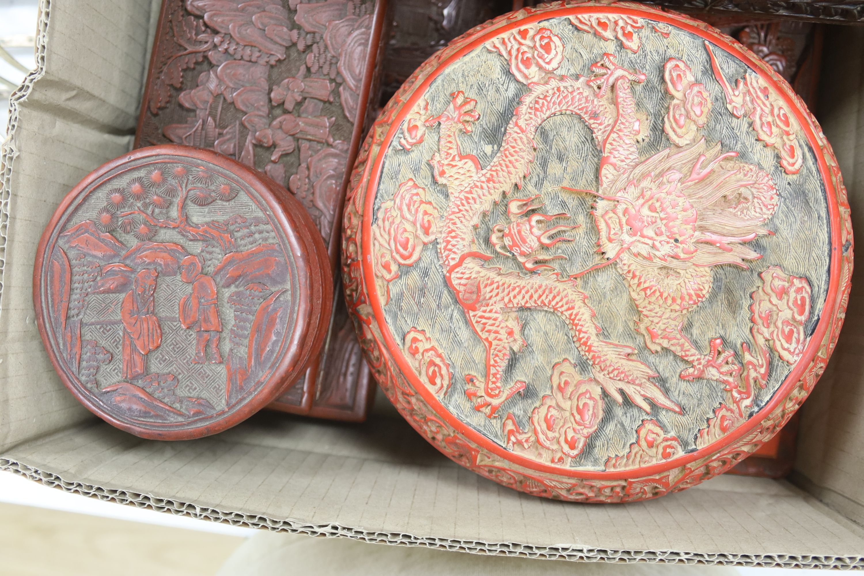 A quantity of Chinese cinnebar lacquer and simulated lacquer boxes, vases, etc.